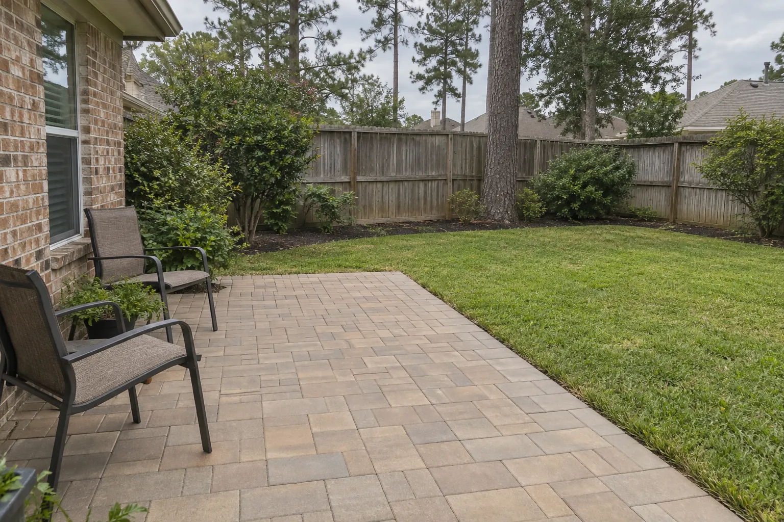 Individual concrete pavers forming an outdoor surface